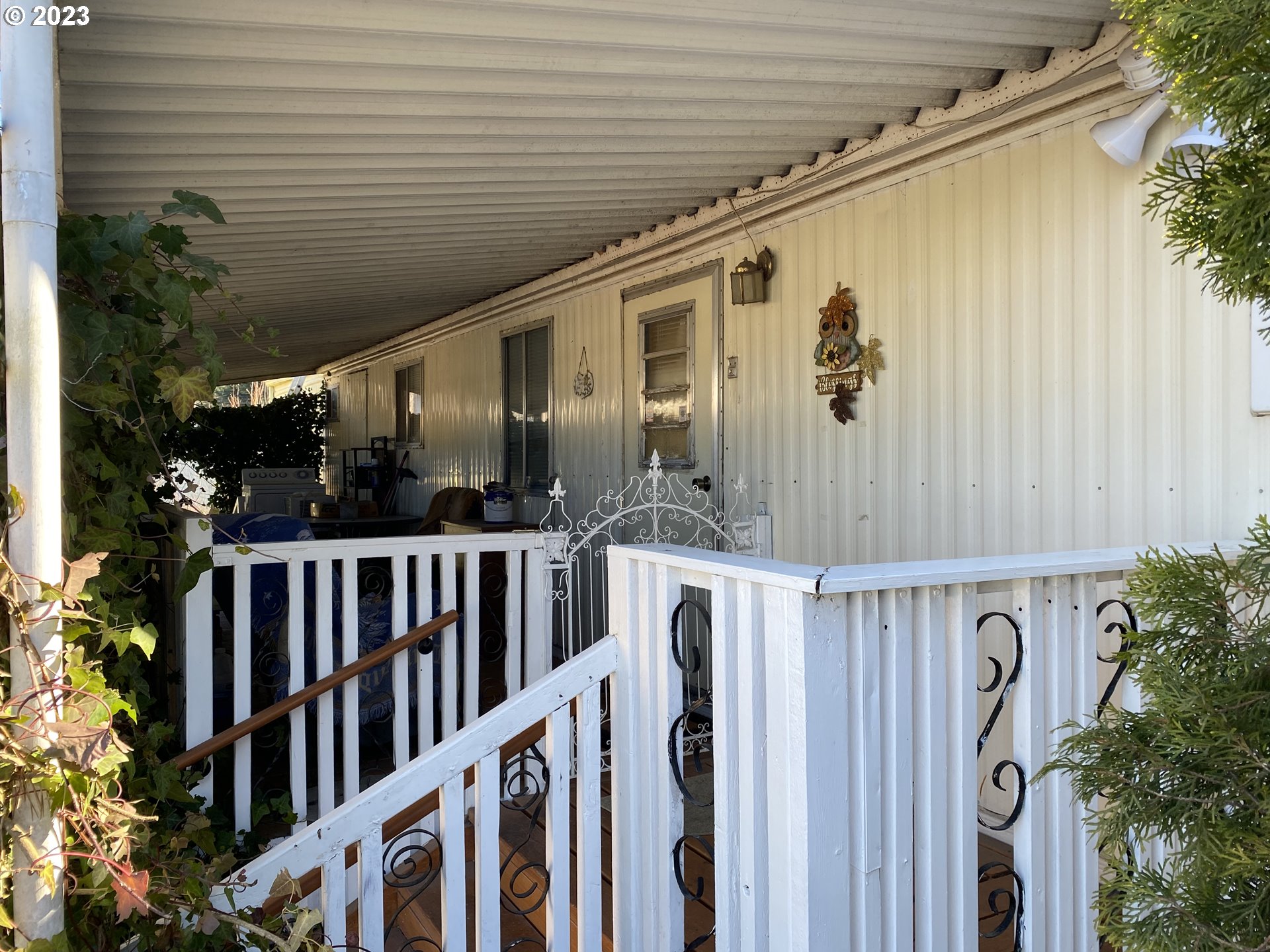 3900 Coburg Road, Unit 52 Eugene, OR 97408 - Photo 4 of 17 a front view of a house with garden