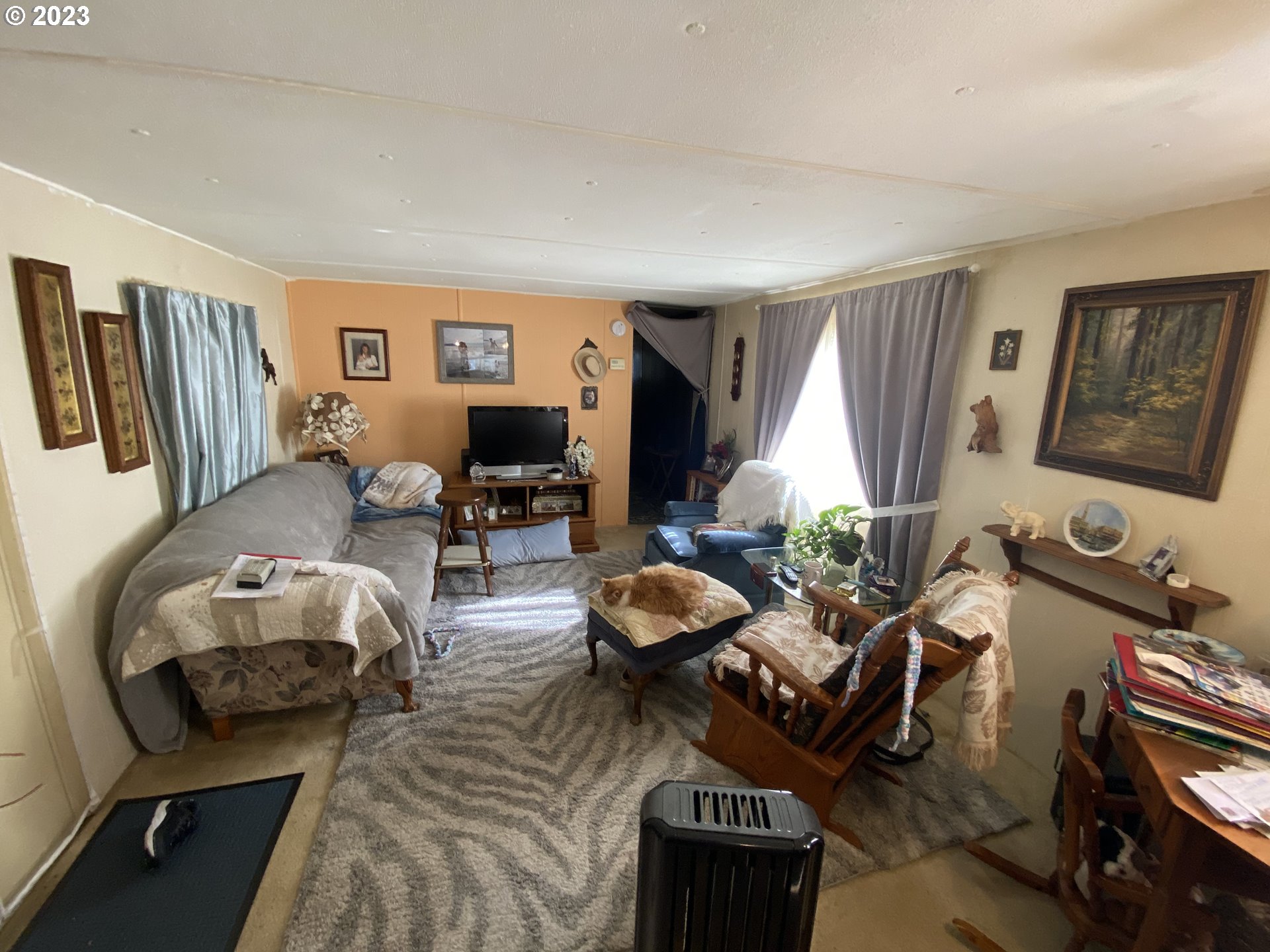 3900 Coburg Road, Unit 52 Eugene, OR 97408 - Photo 6 of 17 a living room with furniture and wooden floor