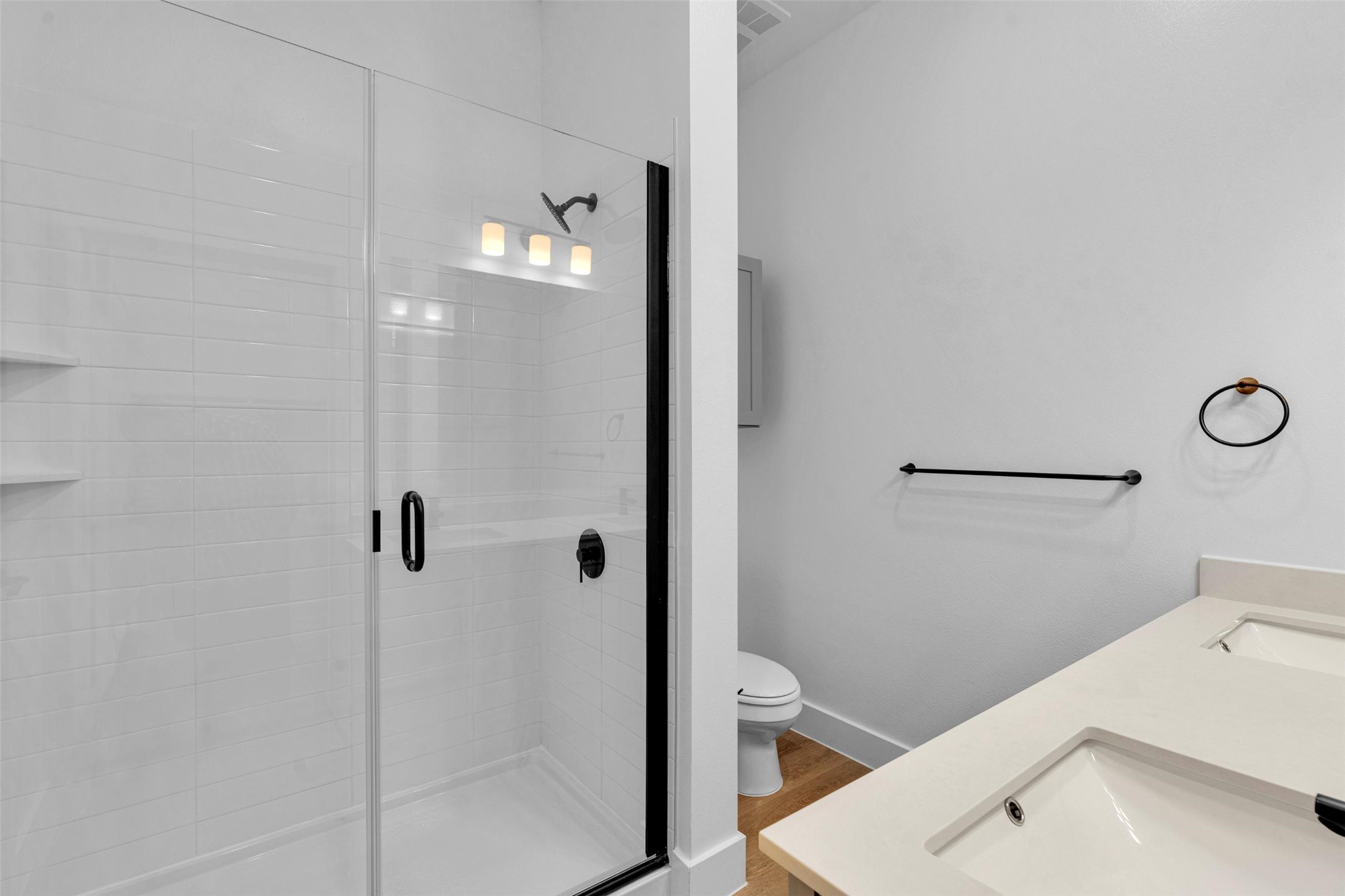 1409 B Forward Drive Little Elm, TX 75068 - Photo 13 of 31 a bathroom with a sink a toilet and shower