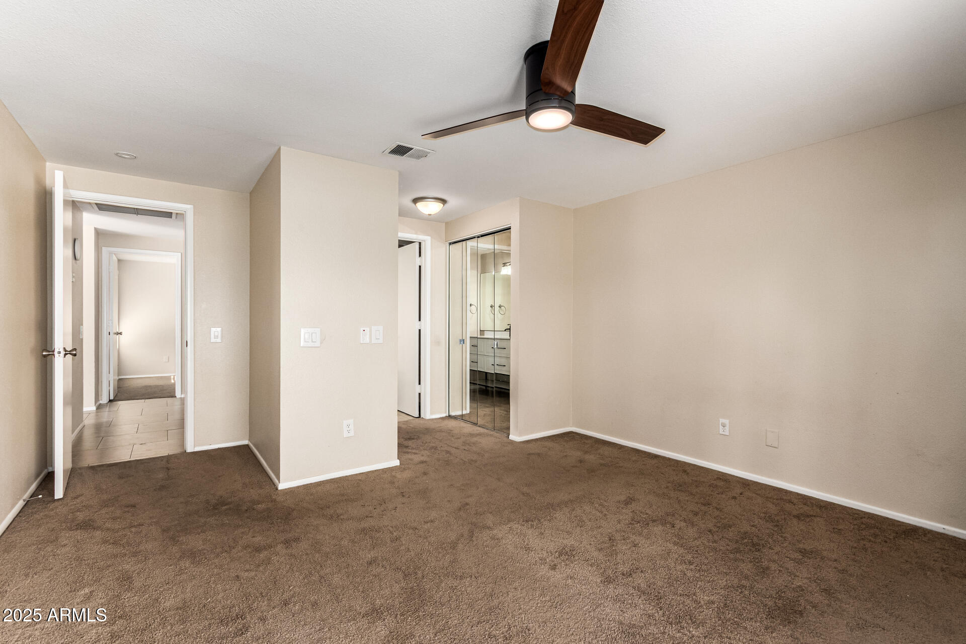2133 North Apollo Court Chandler, AZ 85224 - Photo 13 of 23 a view of an empty room with a window
