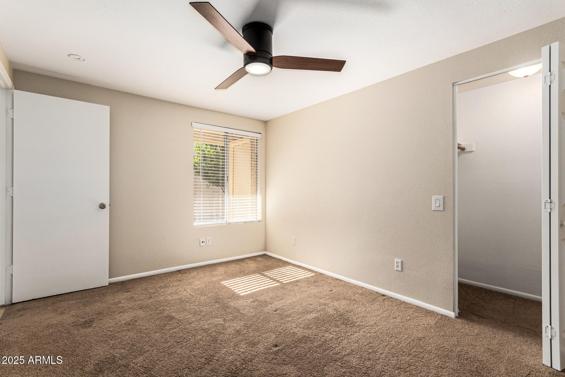 2133 North Apollo Court Chandler, AZ 85224 - Photo 18 of 23 a view of an empty room with a window