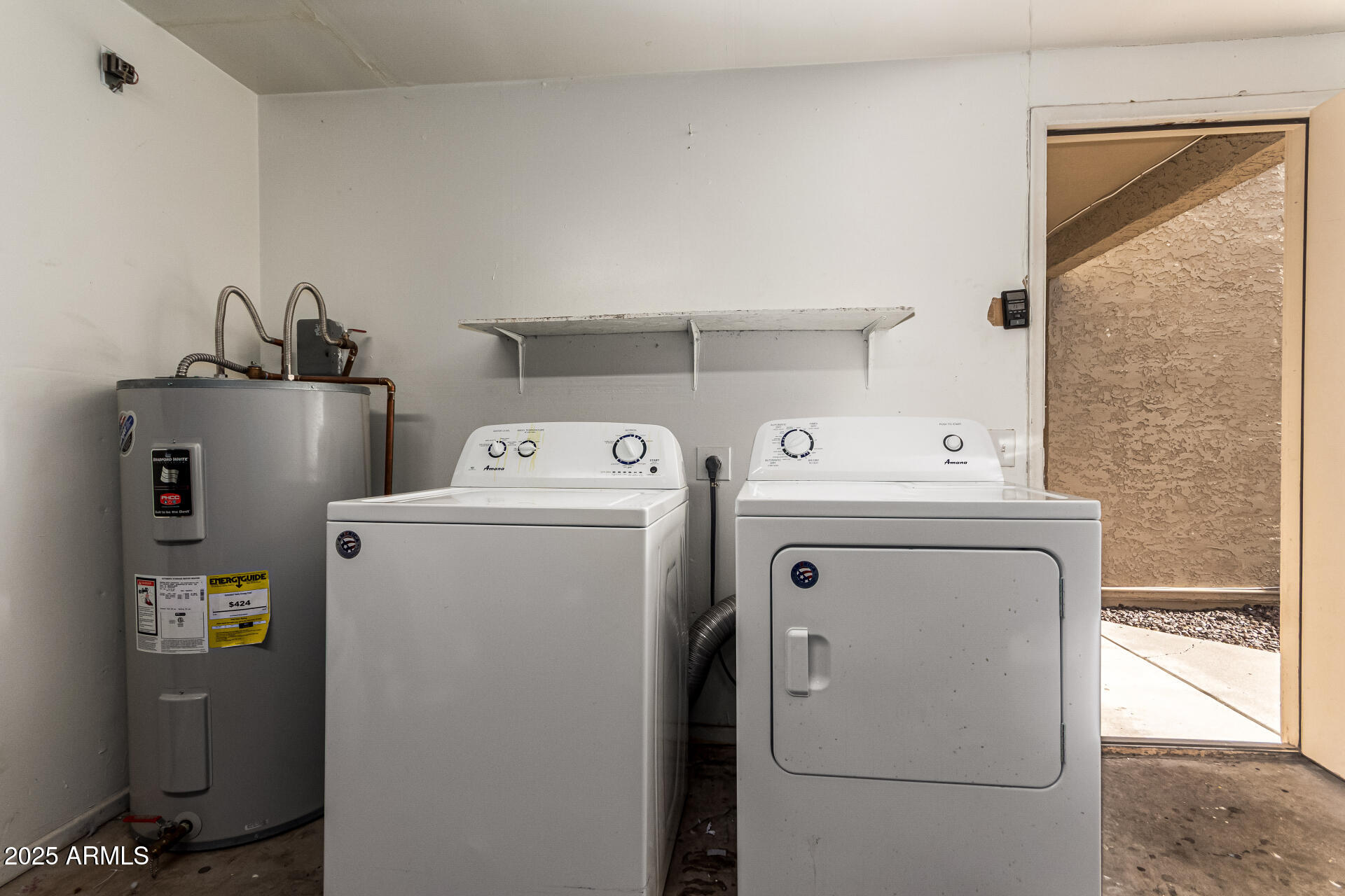 2133 North Apollo Court Chandler, AZ 85224 - Photo 20 of 23 a utility room with dryer and washer