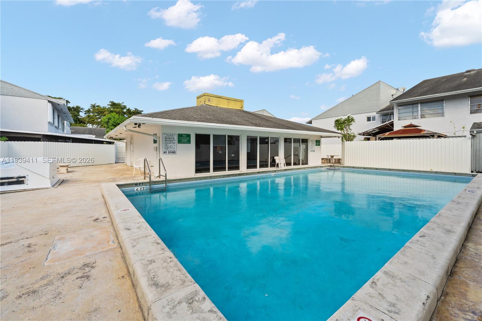 8480 Southwest 156th Place, Unit 620 Miami, FL 33193 - Photo 21 of 23 a view of a house with swimming pool