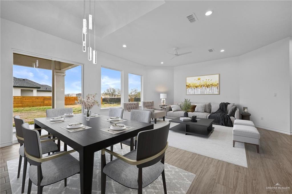 2716 East Conroe Road Edinburg, TX 78542 - Photo 6 of 31 a view of a dining room and livingroom view