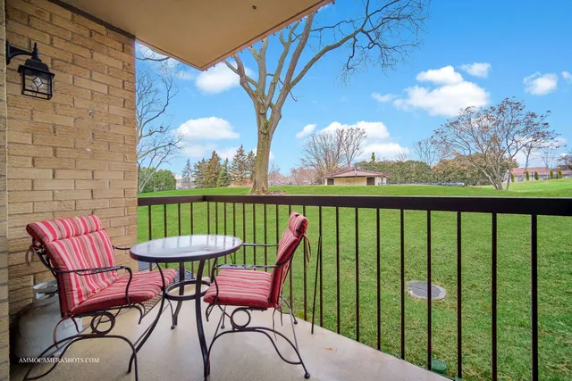 a view of a two chairs in the deck