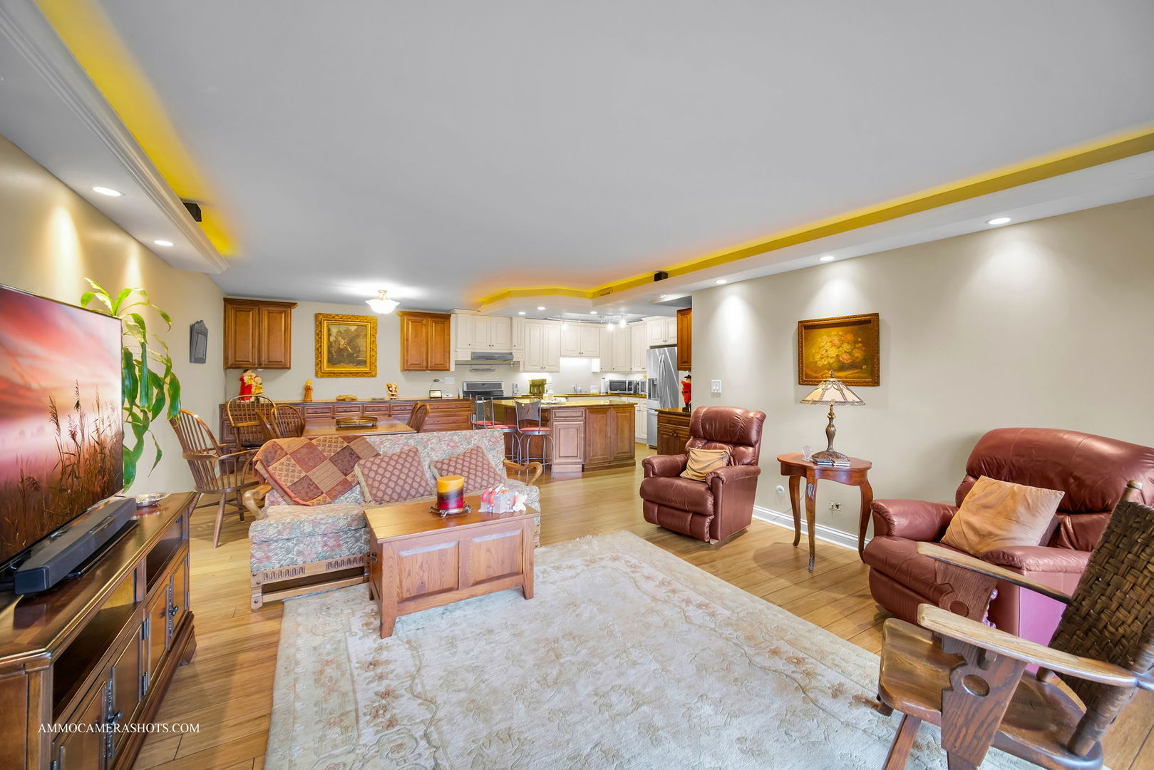 1105 North Mill Street, Unit 117 Naperville, IL 60563 - Photo 5 of 23 a living room with furniture and a flat screen tv