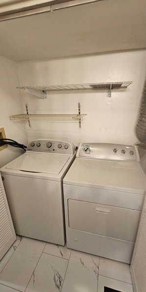 309 Teak Lane Streamwood, IL 60107 - Photo 15 of 16 a utility room with dryer and washer
