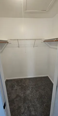 a view of a room with racks on the wall