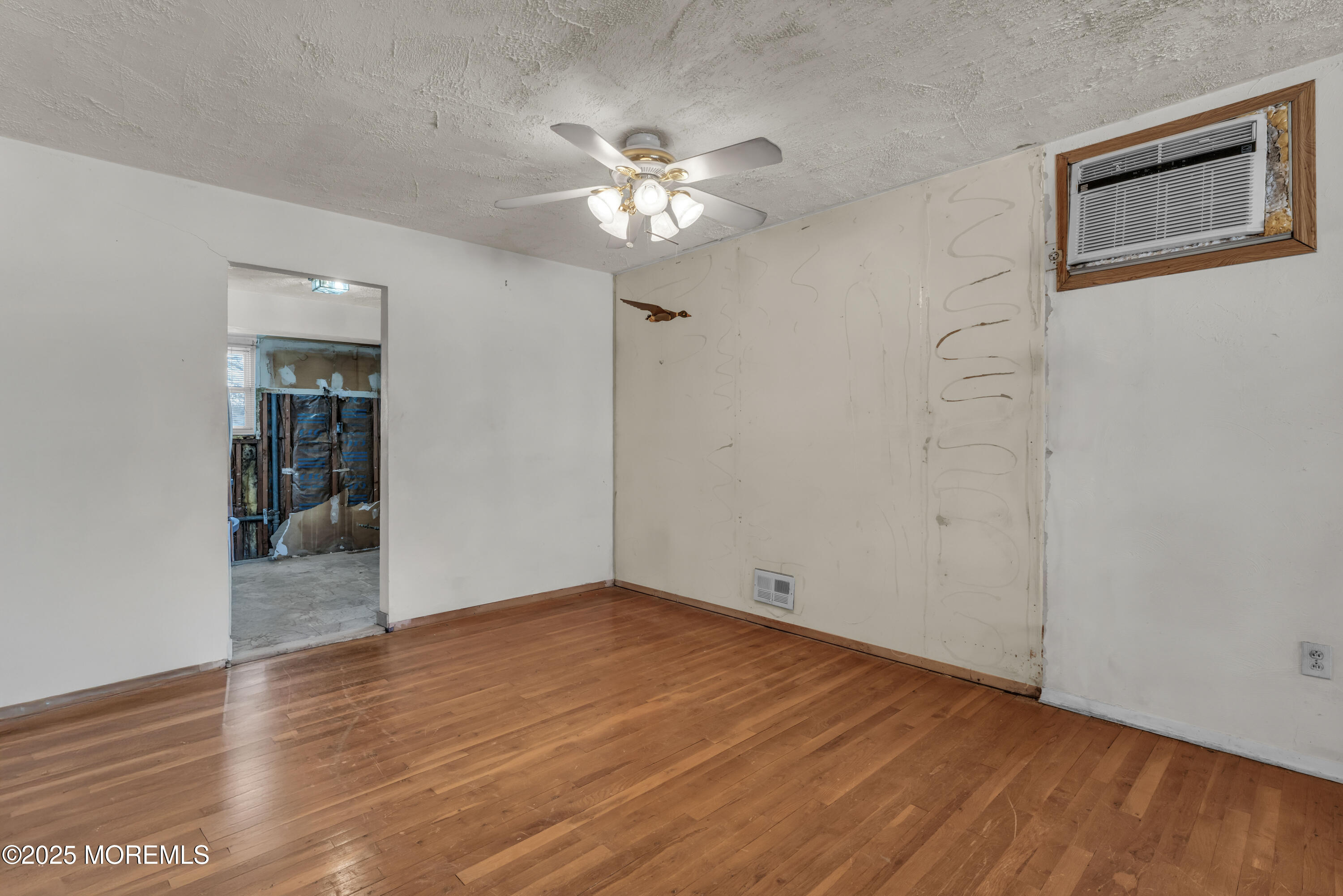 975 South Concourse Keyport, NJ 07735 - Photo 19 of 46 a view of an empty room with wooden floor