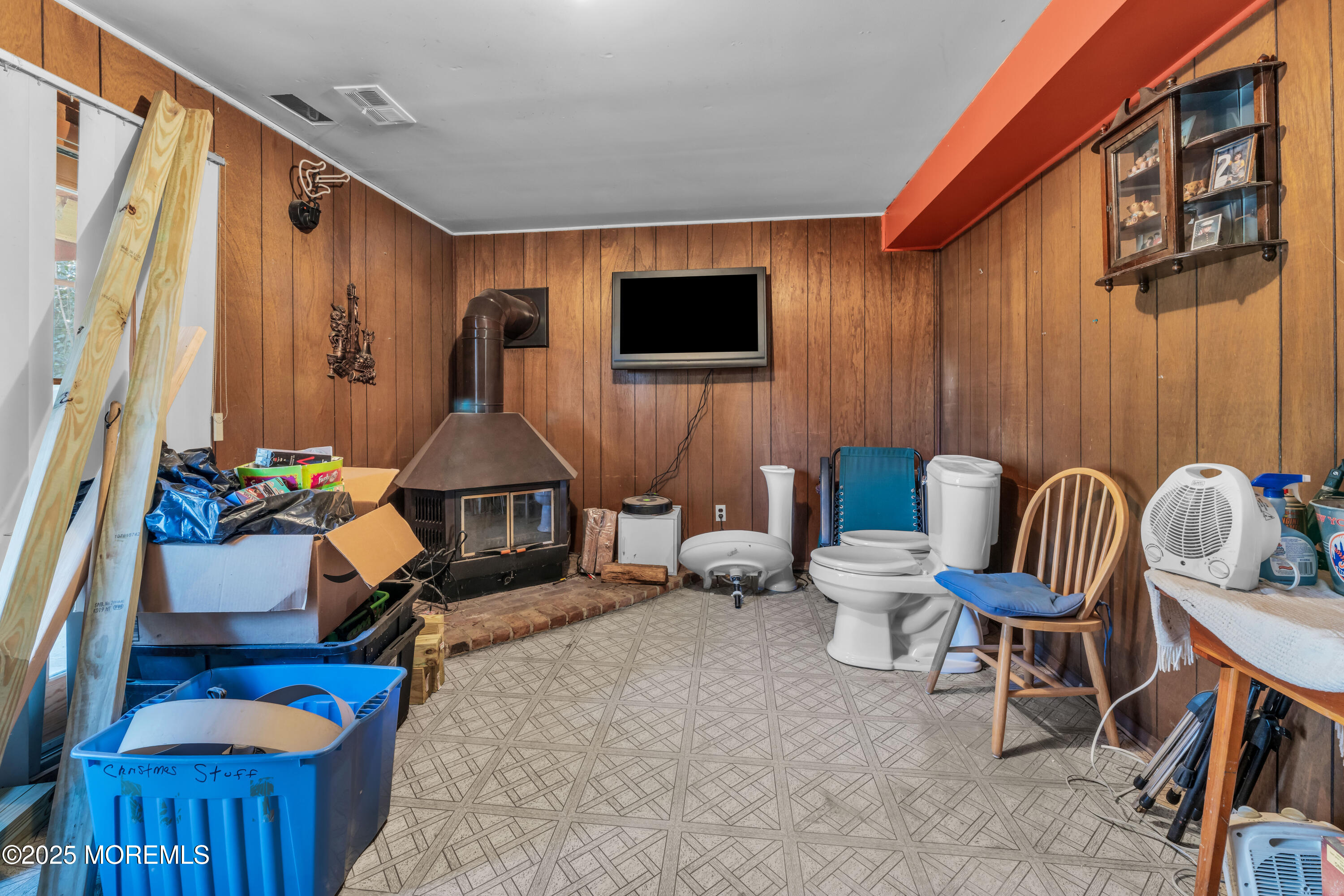 975 South Concourse Keyport, NJ 07735 - Photo 25 of 46 a living room with furniture a flat screen tv and a window