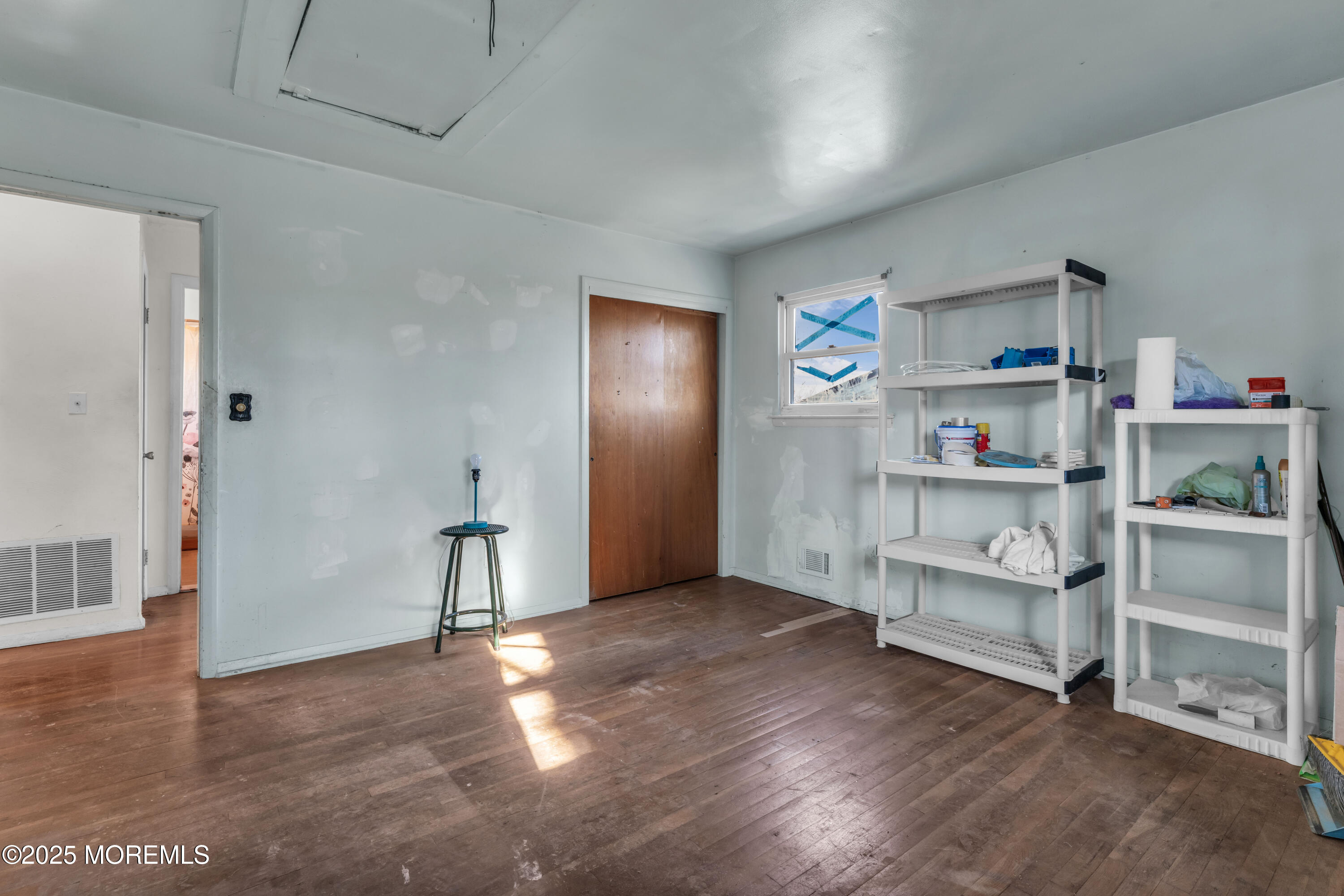 975 South Concourse Keyport, NJ 07735 - Photo 33 of 46 a view of empty room with cabinet and racks