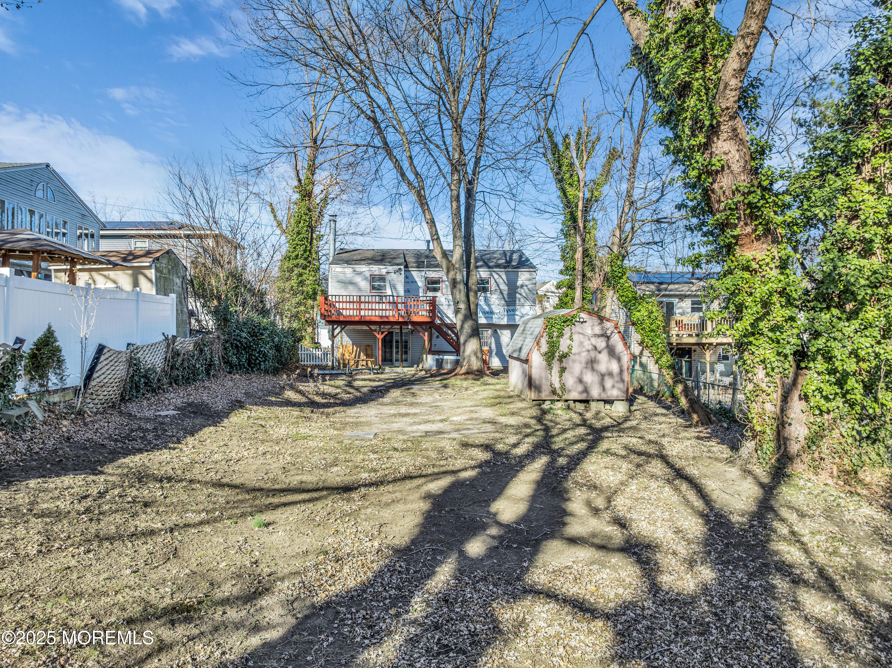 975 South Concourse Keyport, NJ 07735 - Photo 8 of 46 a view of a house with a yard covered in snow