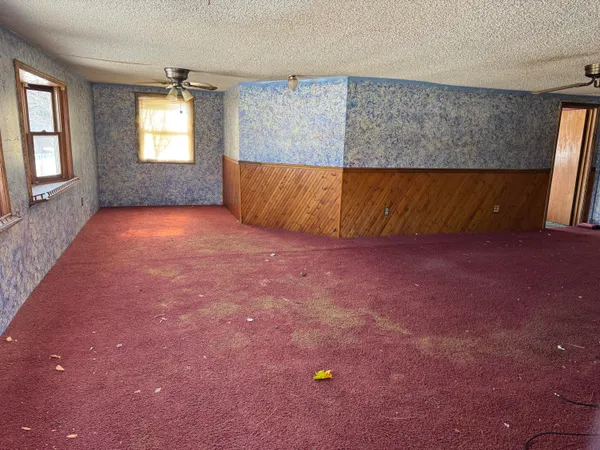 en empty room with windows