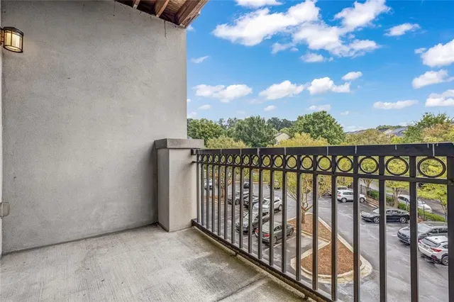 a view of a street view from a balcony