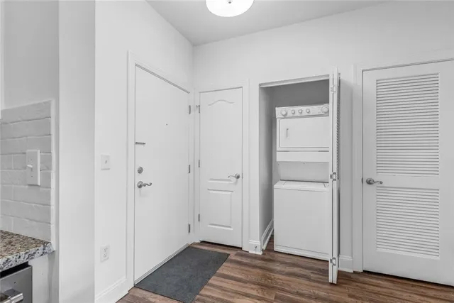 a view of a bathroom with wooden floor