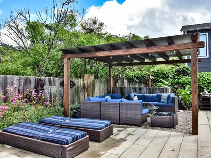a view of a yard with furniture