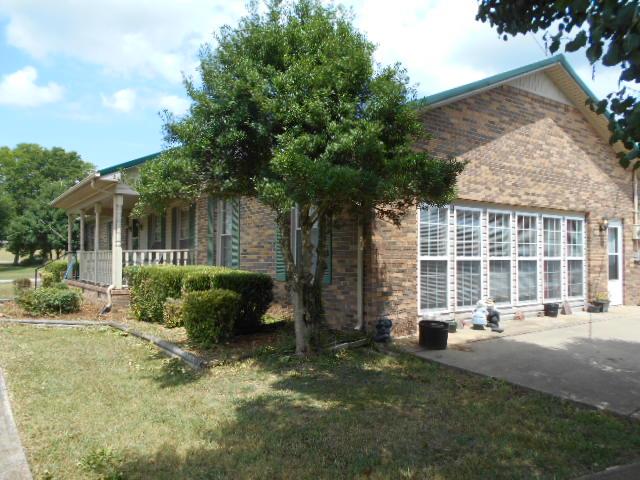 1422 Springplace Road Lewisburg, TN 37091 - Photo 3 of 19 Side view of the main home. Two-car garage and car port are directly behind the home.