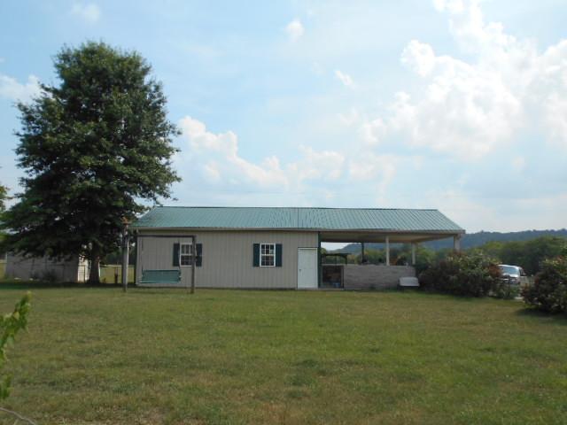 1422 Springplace Road Lewisburg, TN 37091 - Photo 4 of 19 Side view of the garage. Super nice plus a two-car covered carport!