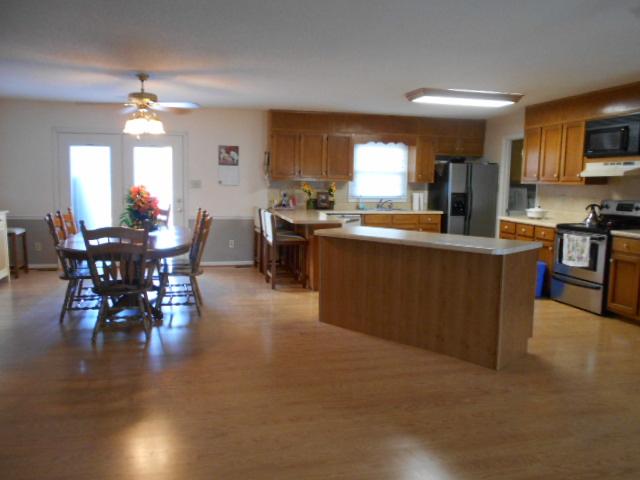 1422 Springplace Road Lewisburg, TN 37091 - Photo 7 of 19 Main House: Bar can be move to accommodate the cook.