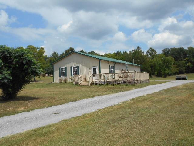 1422 Springplace Road Lewisburg, TN 37091 - Photo 9 of 19 Guest house has central heat and air, two bedrooms and two baths, laundry room, and storage area.