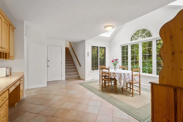 a view of a livingroom with furniture and entryway