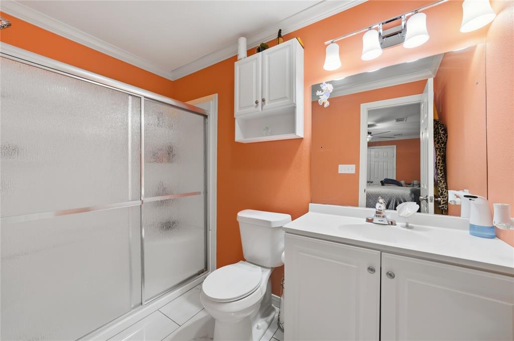3624 Redbird Street Bellmead, TX 76705 - Photo 12 of 20 a bathroom with a sink toilet and shower