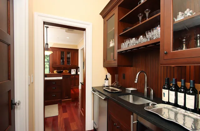 a kitchen with a sink and cabinets