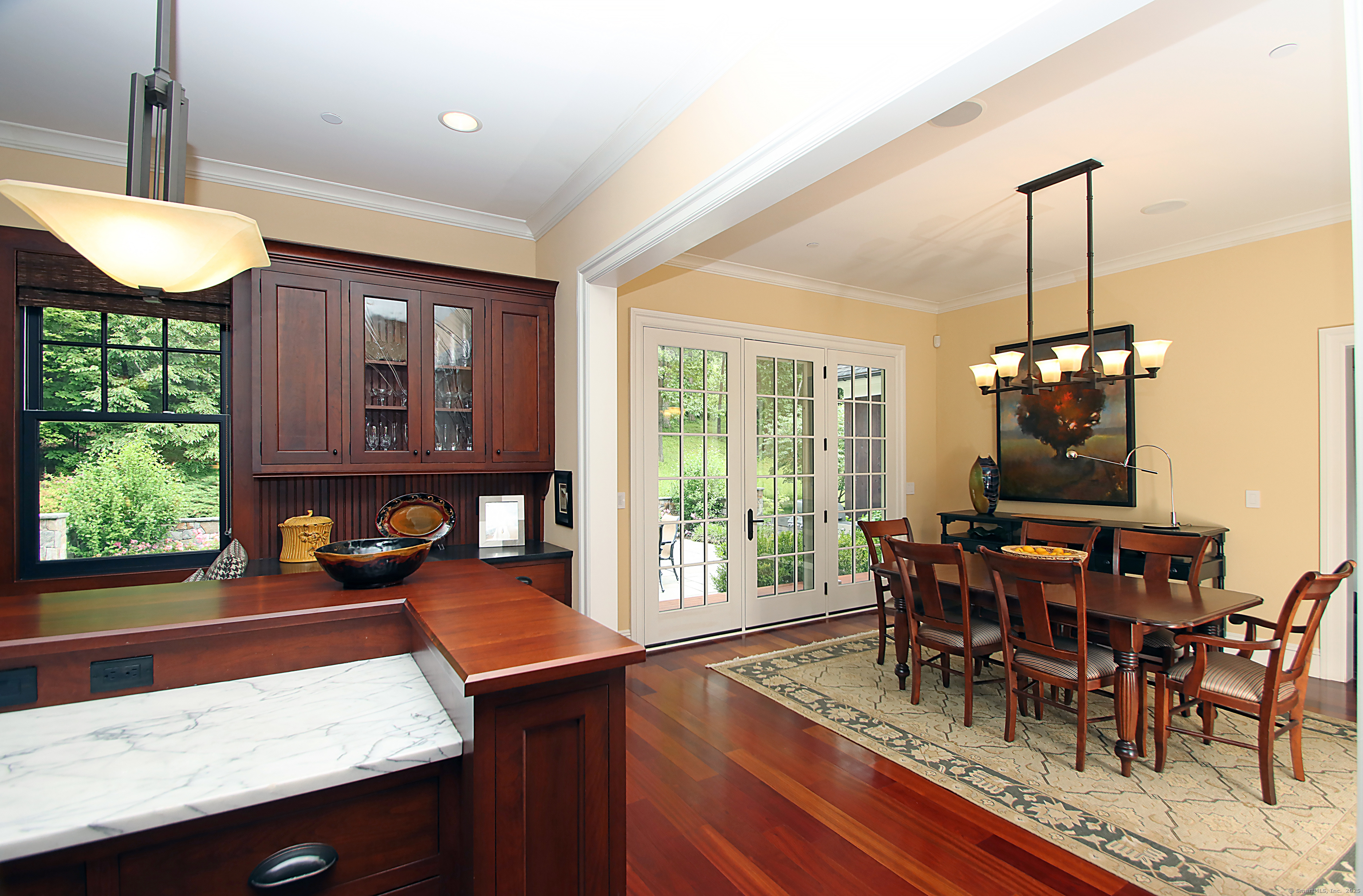 25 Sky View Drive Avon, CT 06001 - Photo 15 of 40 a dining room with furniture and wooden floor