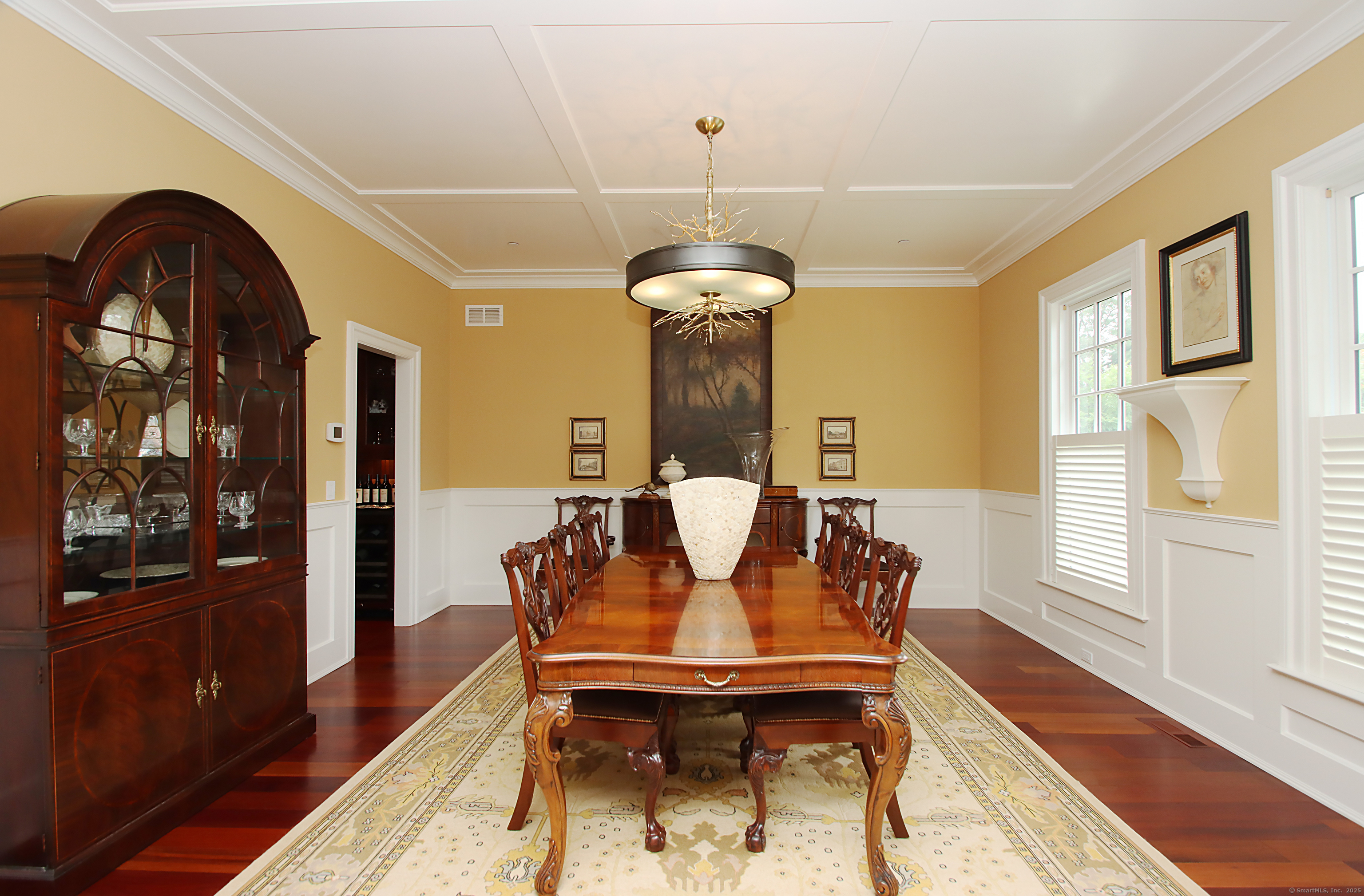 25 Sky View Drive Avon, CT 06001 - Photo 16 of 40 a view of a dining room with furniture window and wooden floor