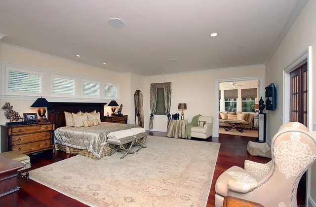 a bed room with a bed and furniture