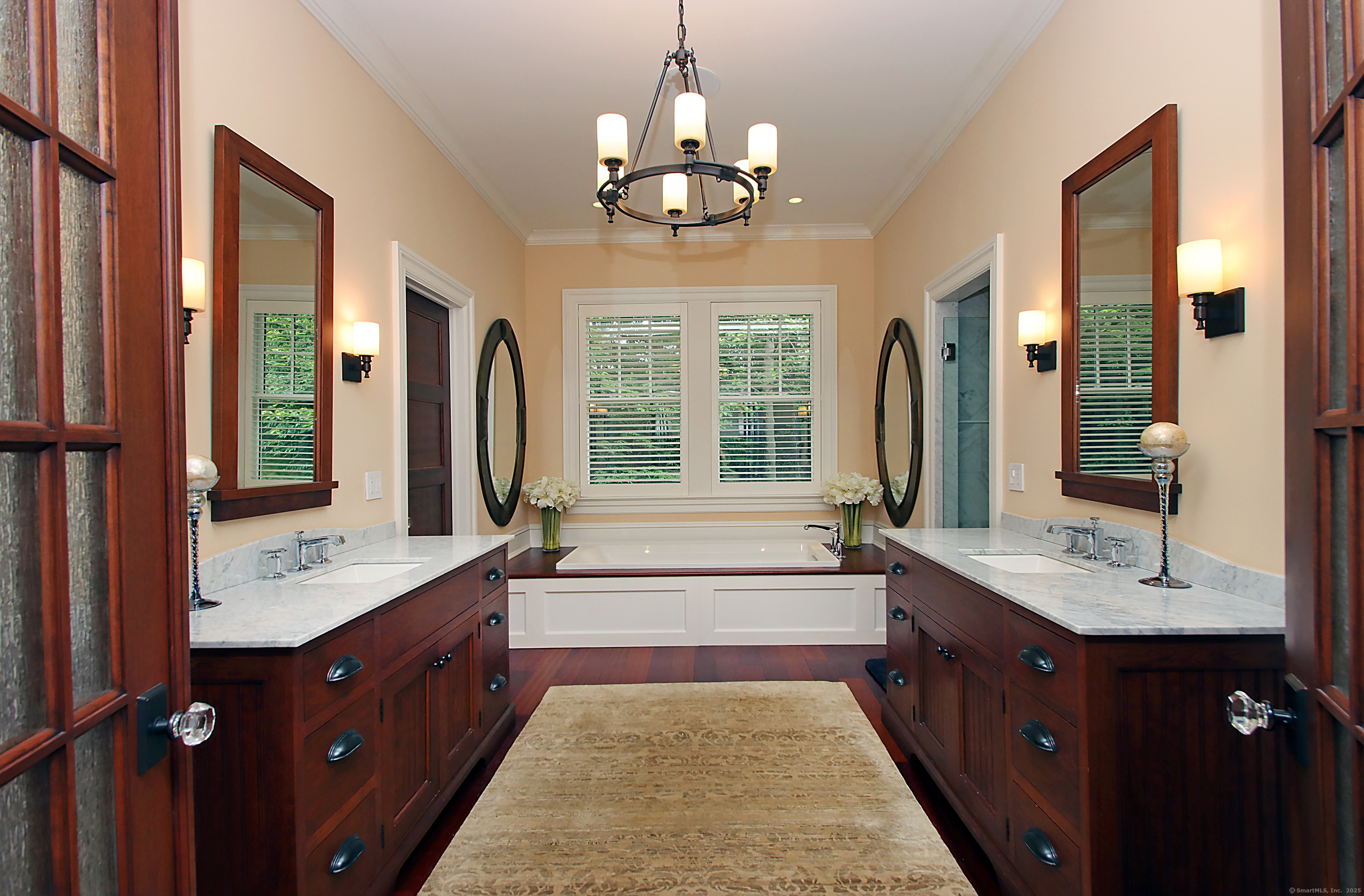 25 Sky View Drive Avon, CT 06001 - Photo 22 of 40 a bathroom with a tub sink double vanity granite and a window