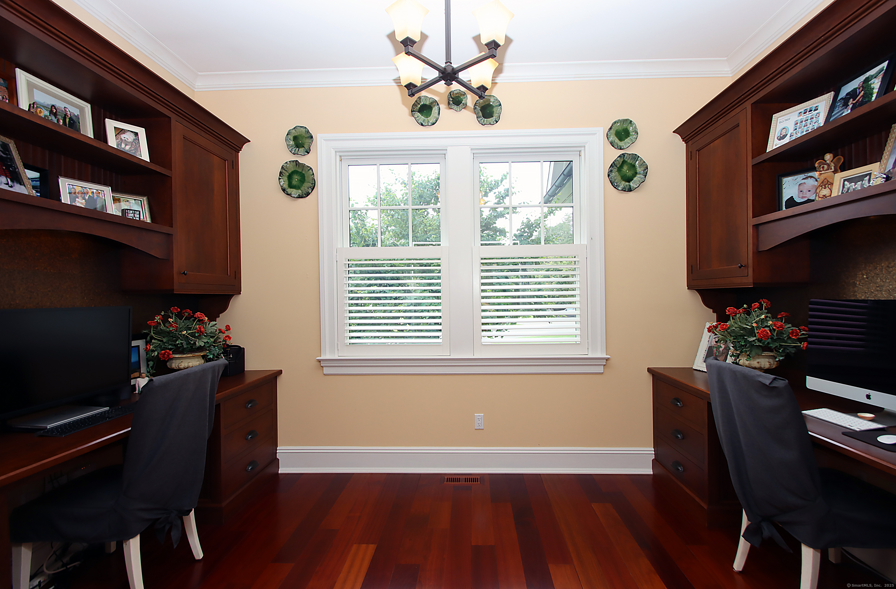 25 Sky View Drive Avon, CT 06001 - Photo 27 of 40 a workspace with furniture a chandelier and wooden floor