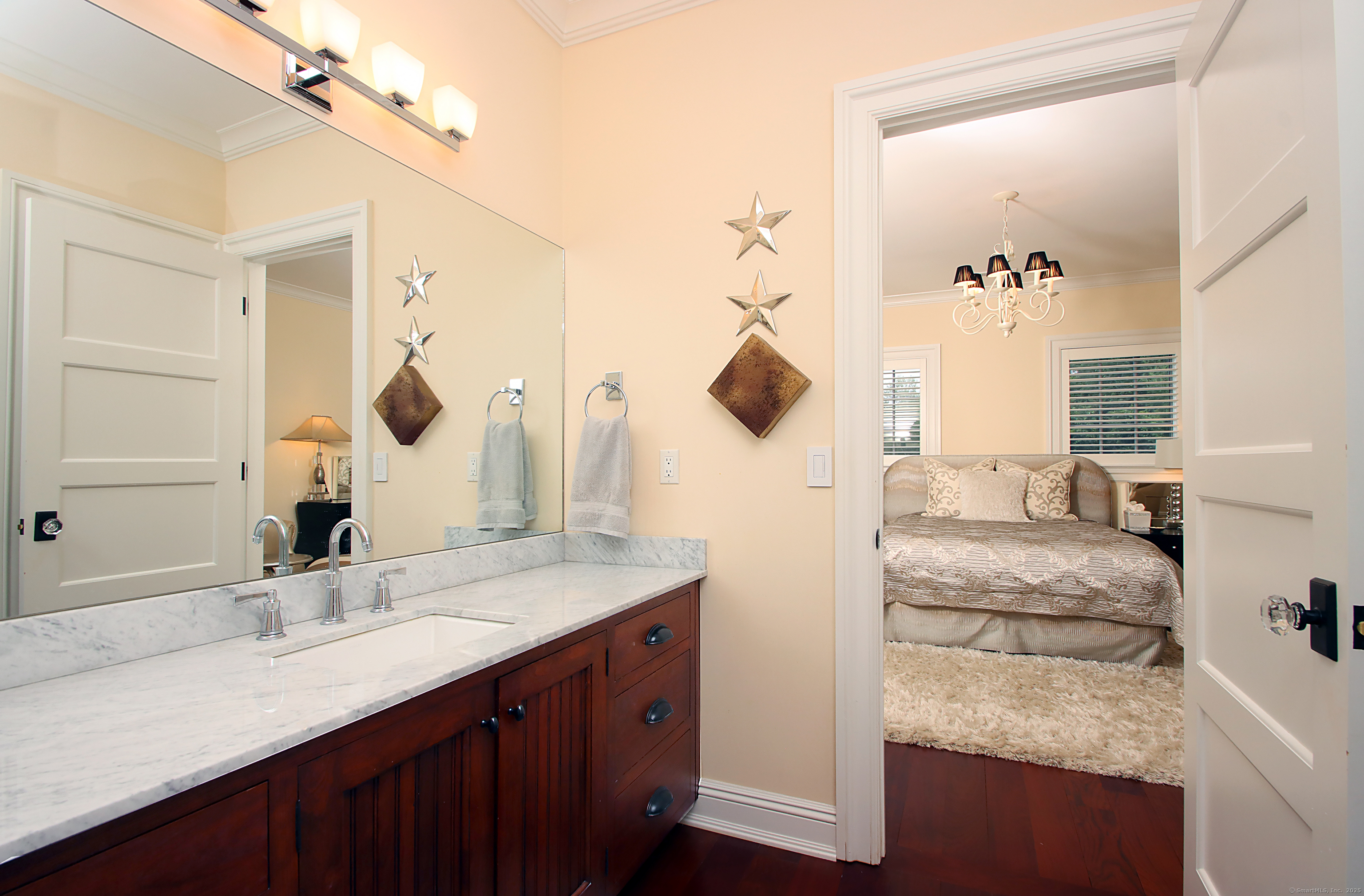 25 Sky View Drive Avon, CT 06001 - Photo 29 of 40 a bathroom with a granite countertop sink and a mirror