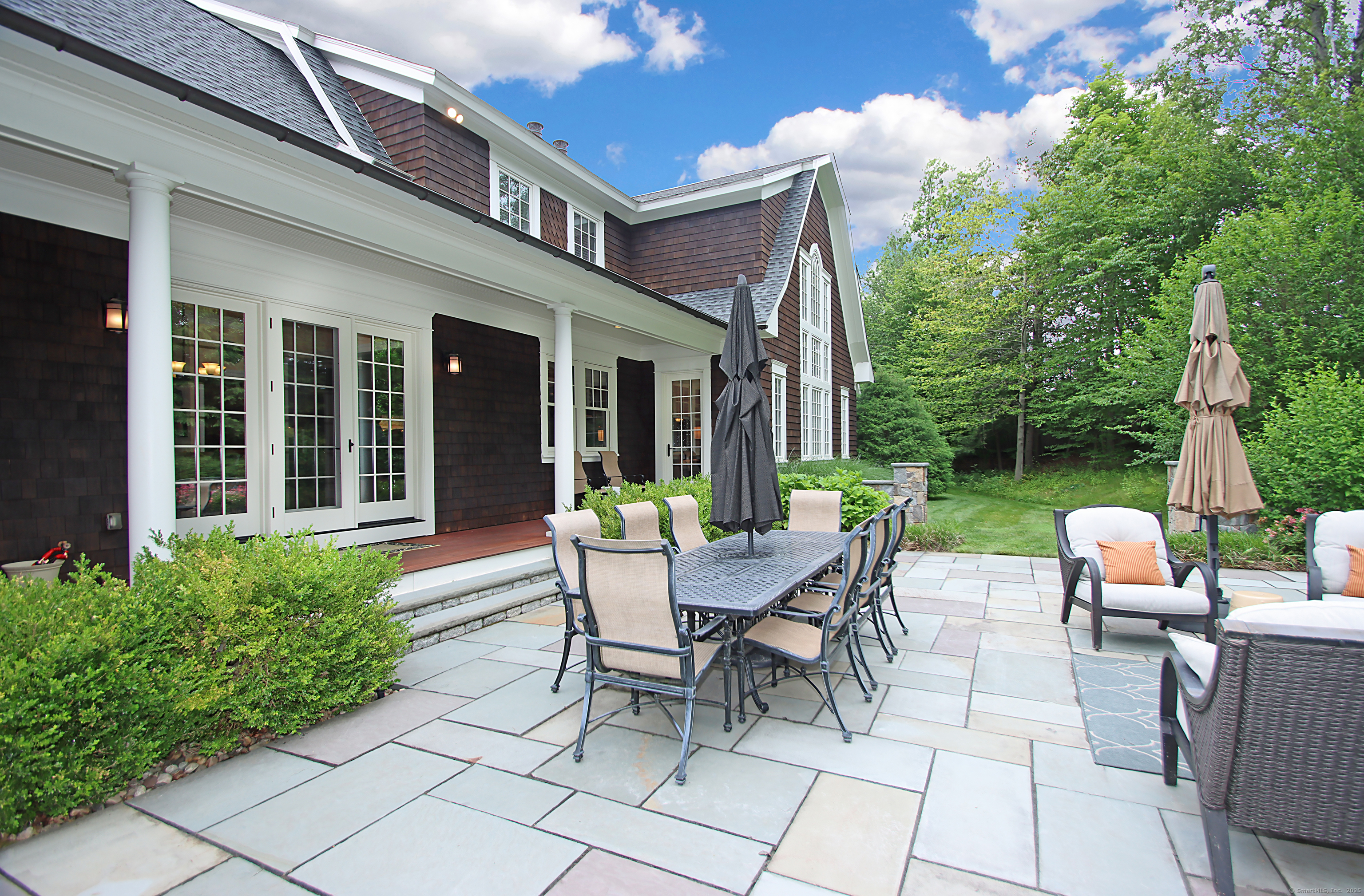 25 Sky View Drive Avon, CT 06001 - Photo 39 of 40 a view of a house with backyard sitting area and garden
