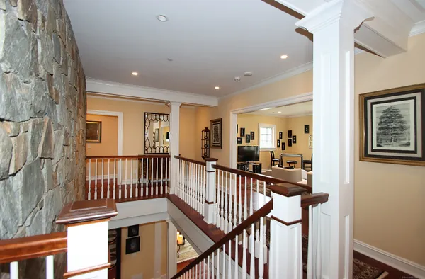a view of a hallway with a livingroom