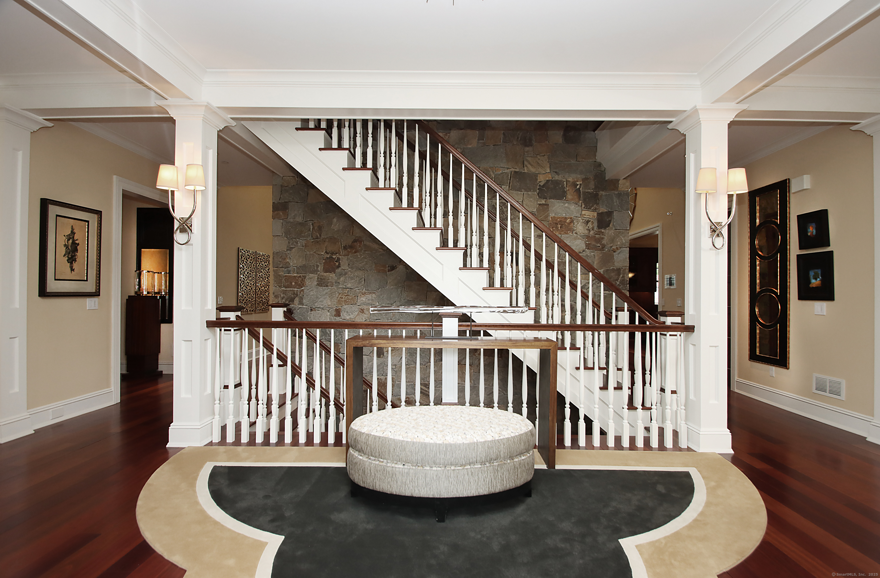 25 Sky View Drive Avon, CT 06001 - Photo 5 of 40 a view of entryway with wooden floor and stairs
