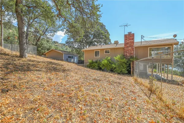 a view of swimming pool with a yard
