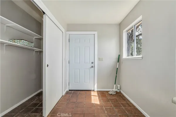 a kitchen with stainless steel appliances granite countertop a sink and a stove