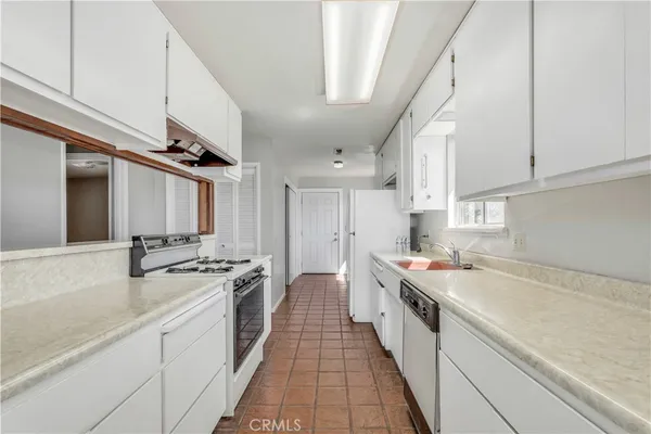 a view of a hallway with a door