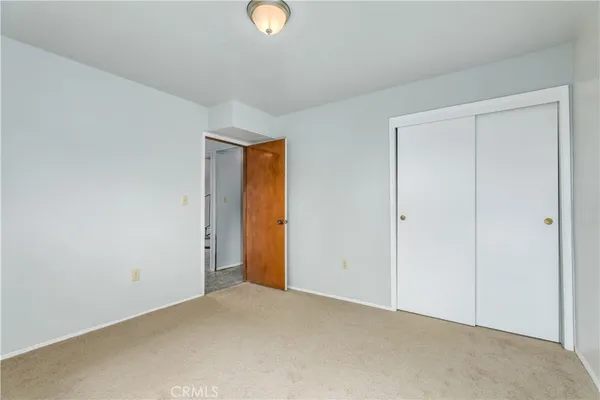 a view of a living room with a large window