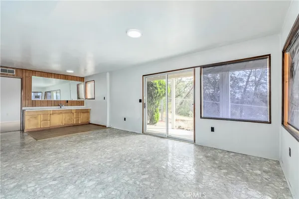 an aerial view of residential house with outdoor space