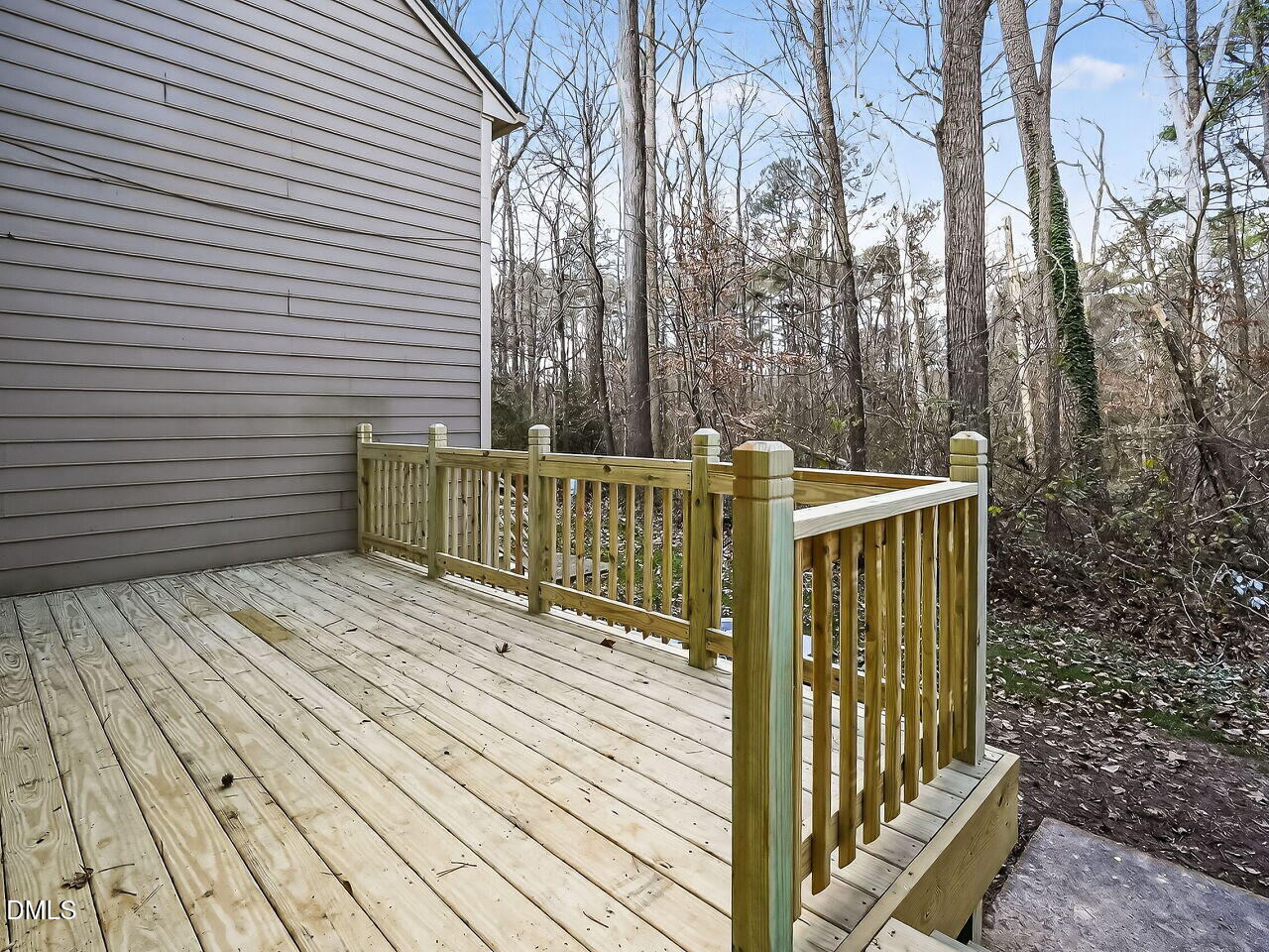 3204 Coachman's Way Durham, NC 27705 - Photo 23 of 27 a view of a wooden deck
