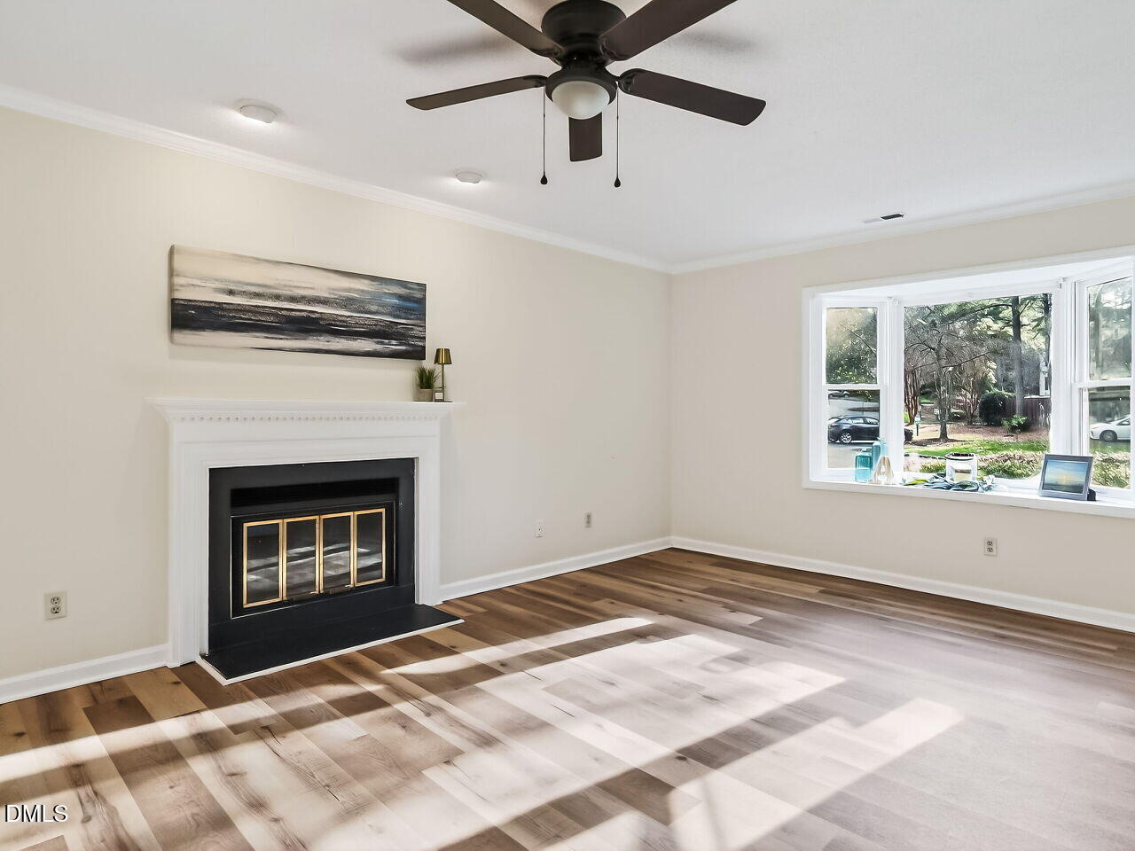 3204 Coachman's Way Durham, NC 27705 - Photo 5 of 27 a view of an empty room with window and fire place