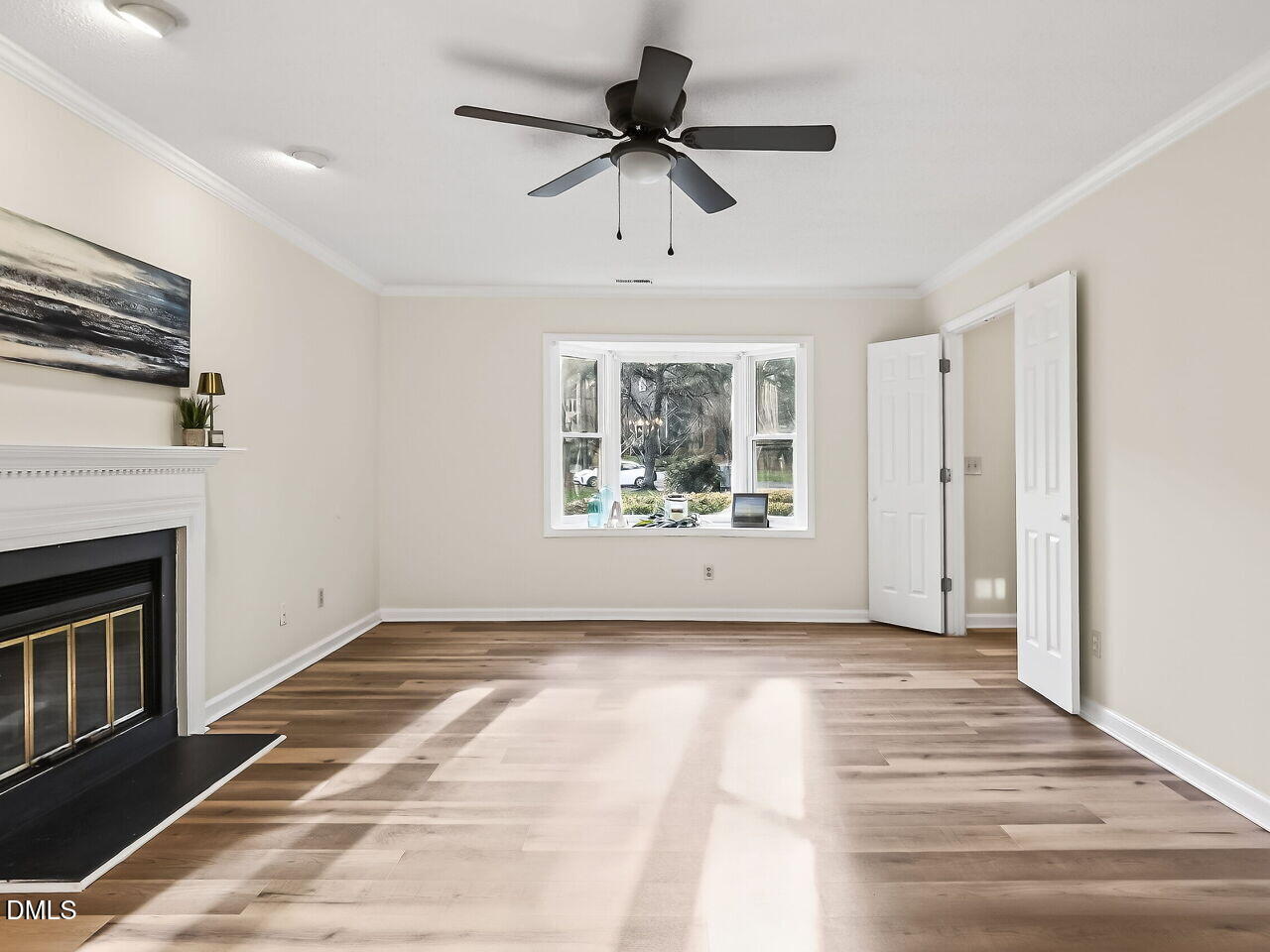 3204 Coachman's Way Durham, NC 27705 - Photo 6 of 27 a view of an empty room with a window and a kitchen