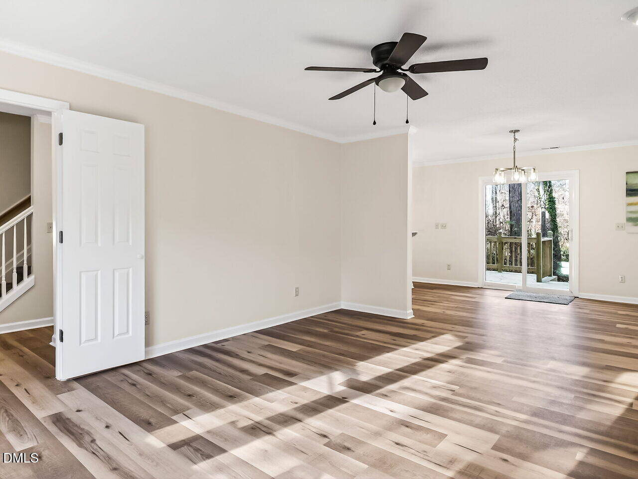 3204 Coachman's Way Durham, NC 27705 - Photo 8 of 27 a view of an empty room and window and wooden floor