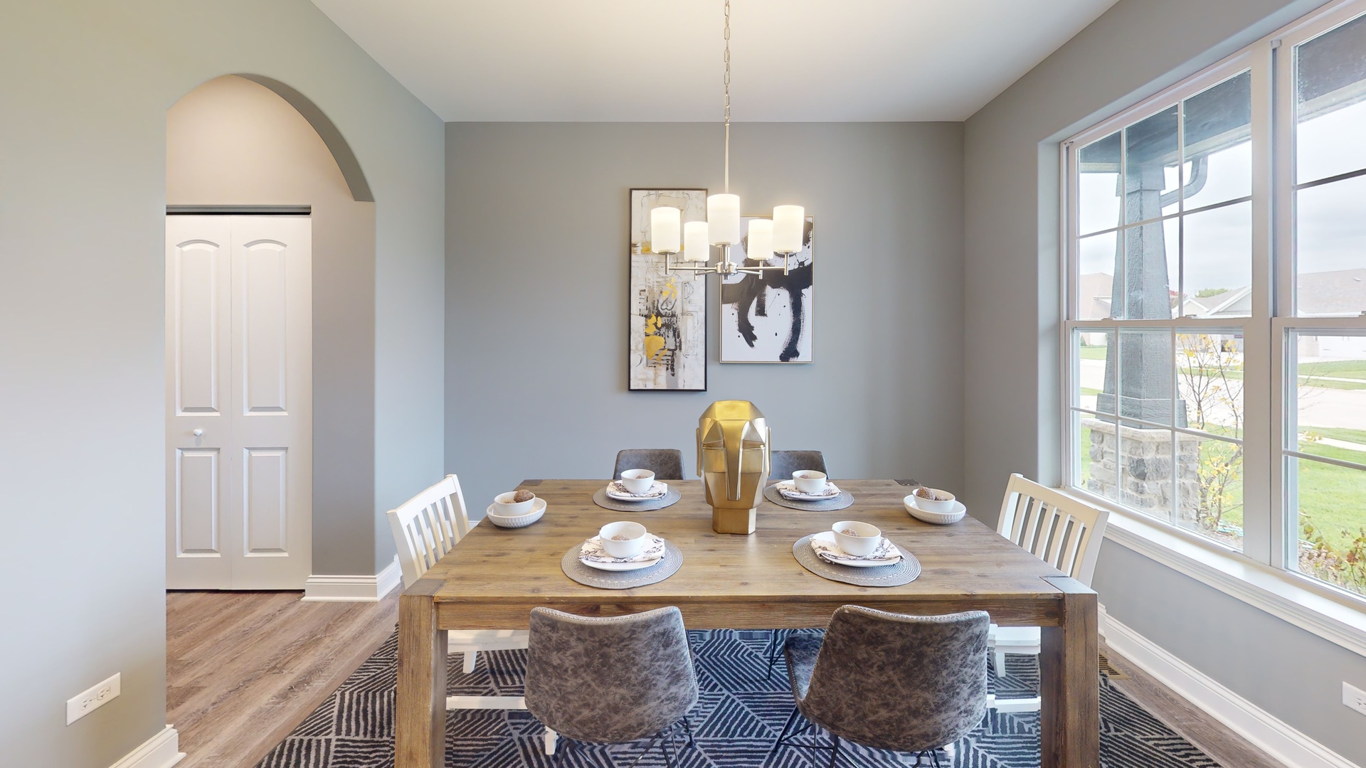 286 Wild Prairie Pointe Hampshire, IL 60140 - Photo 8 of 25 a view of a dining room with furniture wooden floor and chandelier