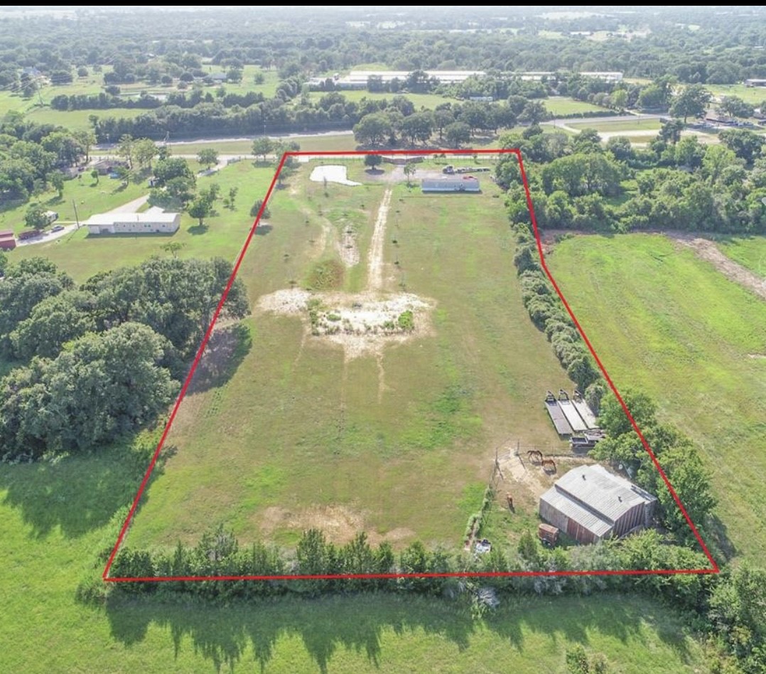 21728 Fairground Road Hempstead, TX 77445 - Photo 11 of 23 a view of a lake with a yard and outdoor seating
