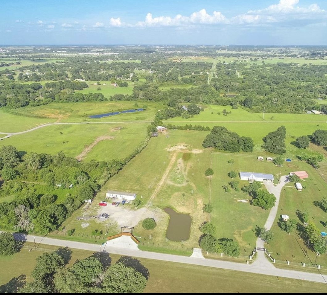 21728 Fairground Road Hempstead, TX 77445 - Photo 9 of 23 a view of an ocean and a yard