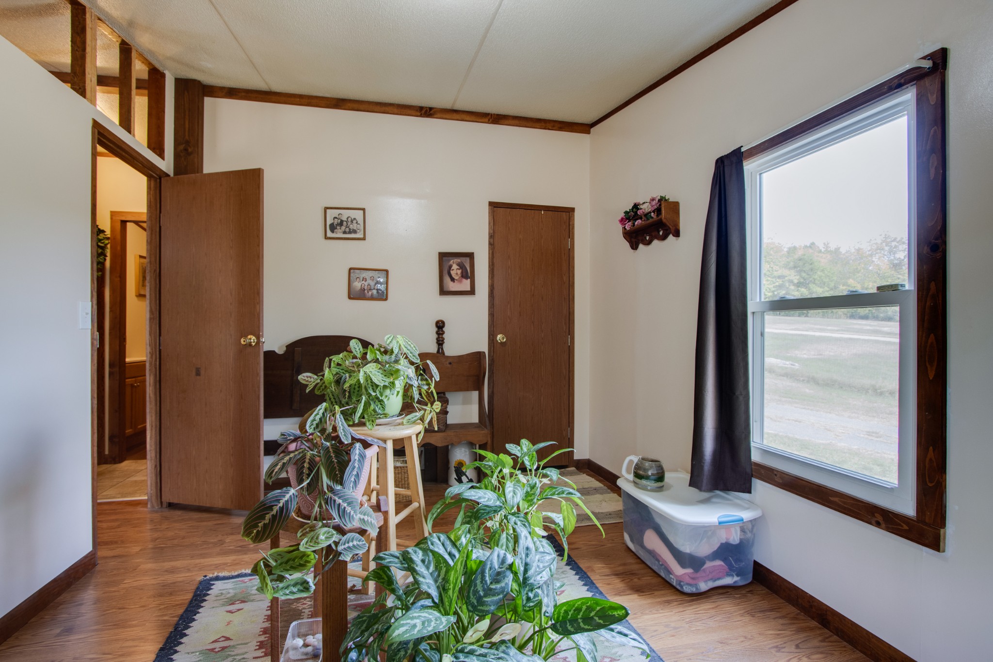745 Holloway Road Lebanon, TN 37090 - Photo 17 of 30 a living room with furniture and a potted plant