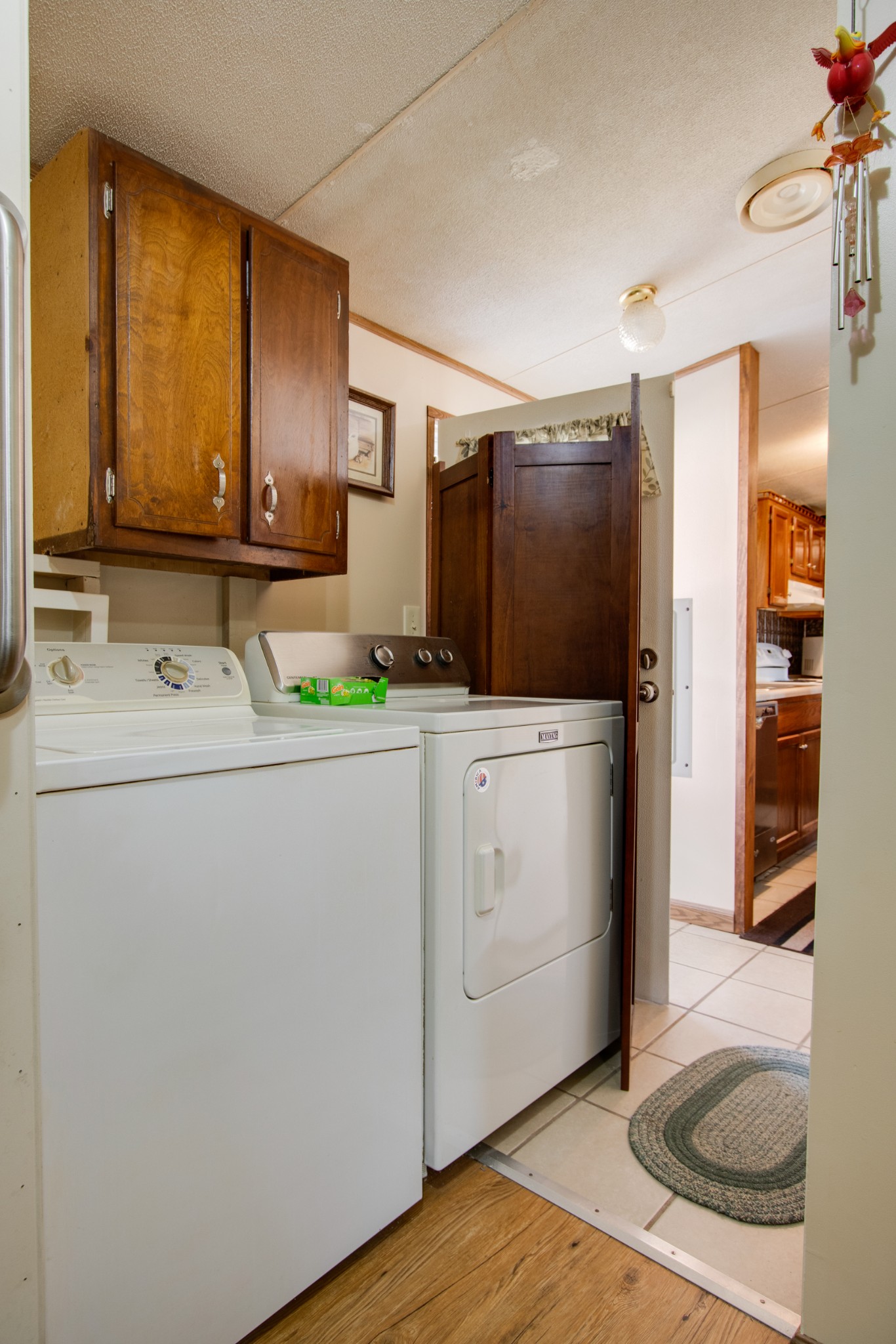 745 Holloway Road Lebanon, TN 37090 - Photo 21 of 30 a utility room with cabinets washer and dryer